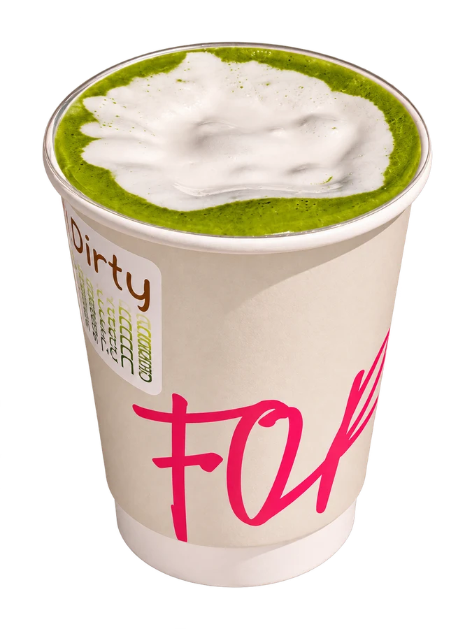 Iced matcha drink on a red and white striped beach towel, FOR Sunny Days